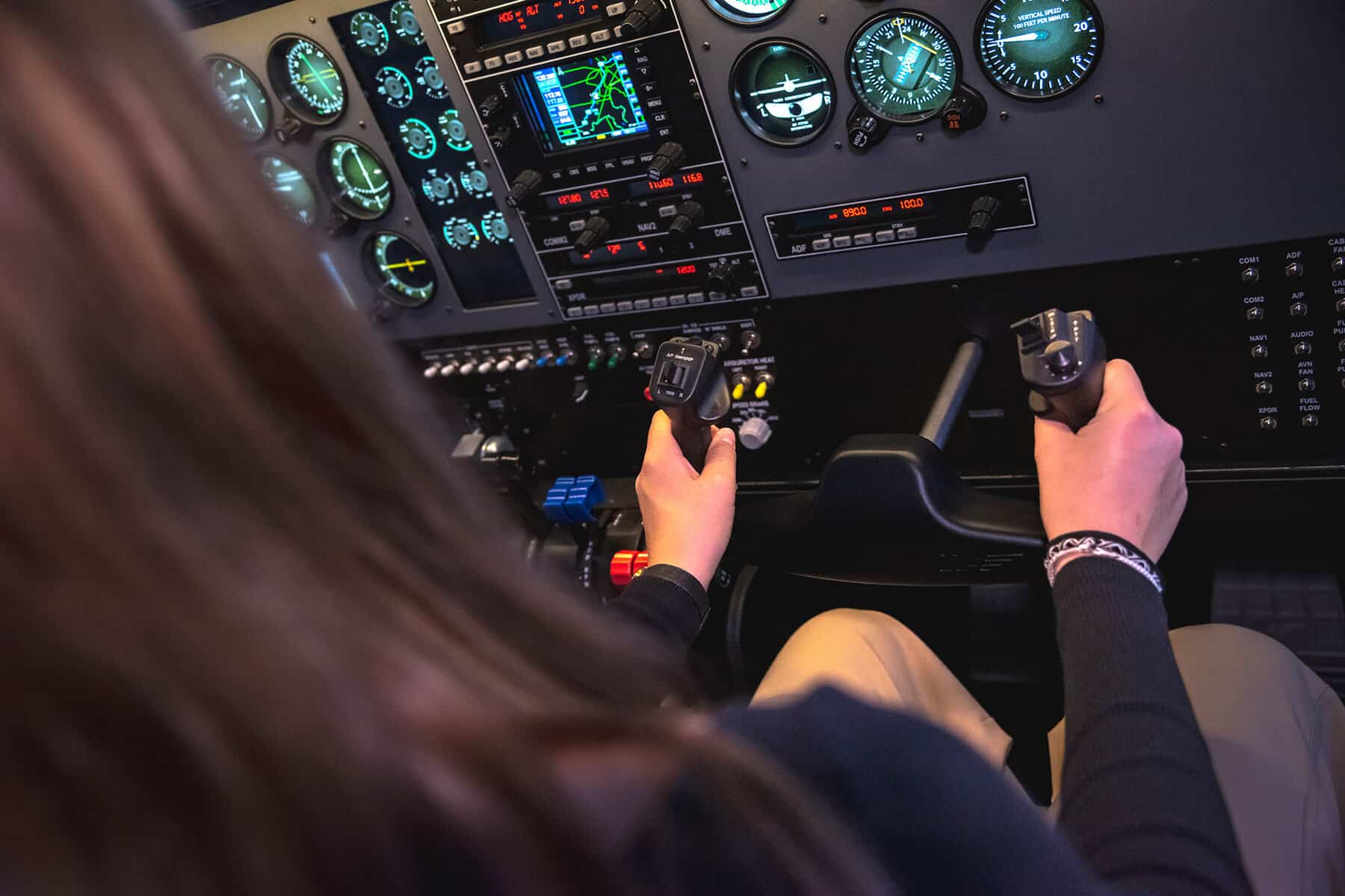 BE58-close-cockpit-her-hands-1920x1280